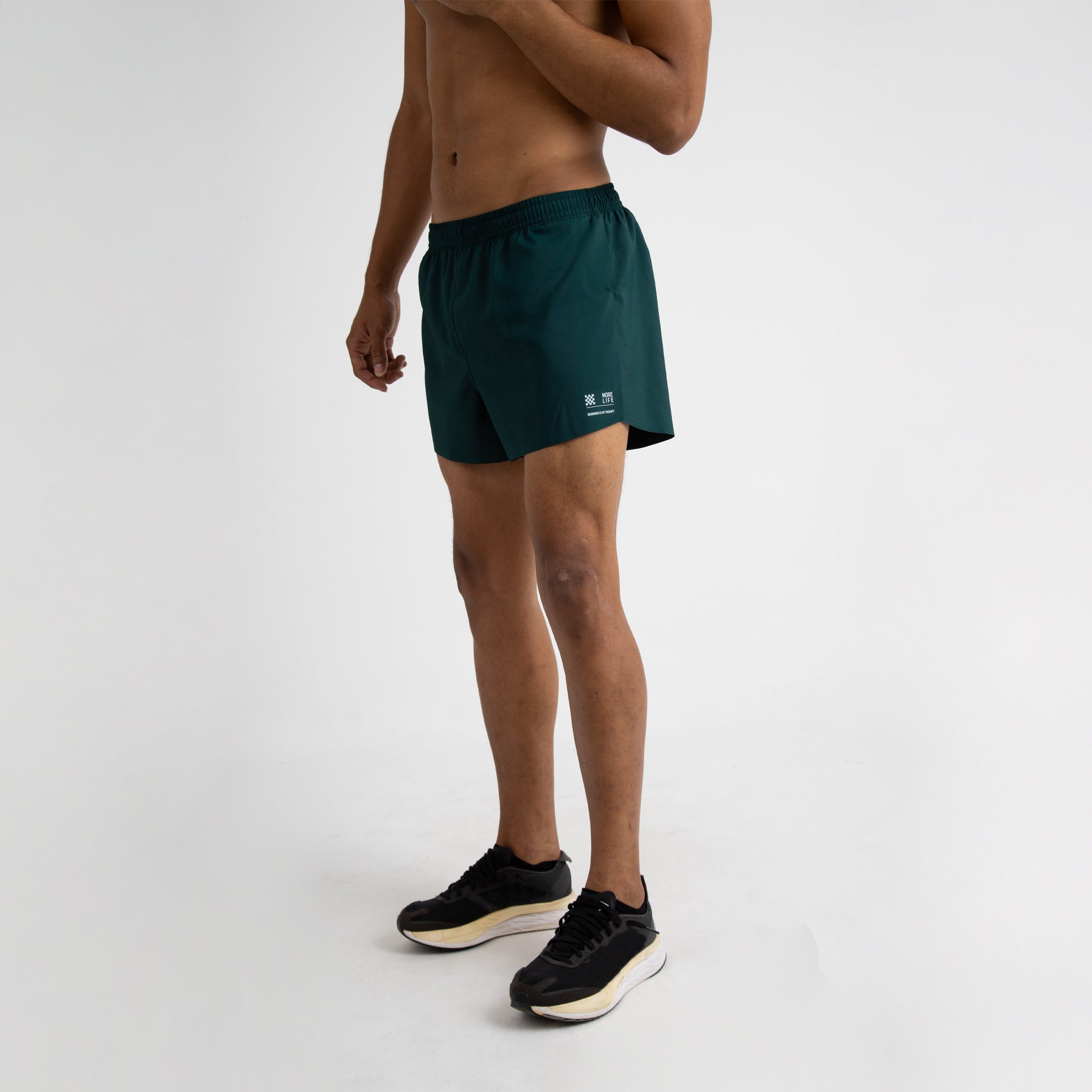 Pantaloneta corta verde esmeralda